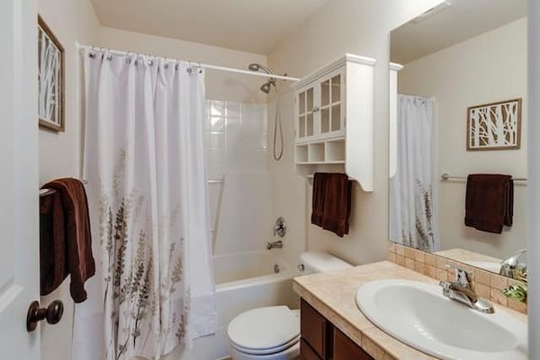 How can you make a small bathroom feel luxurious?